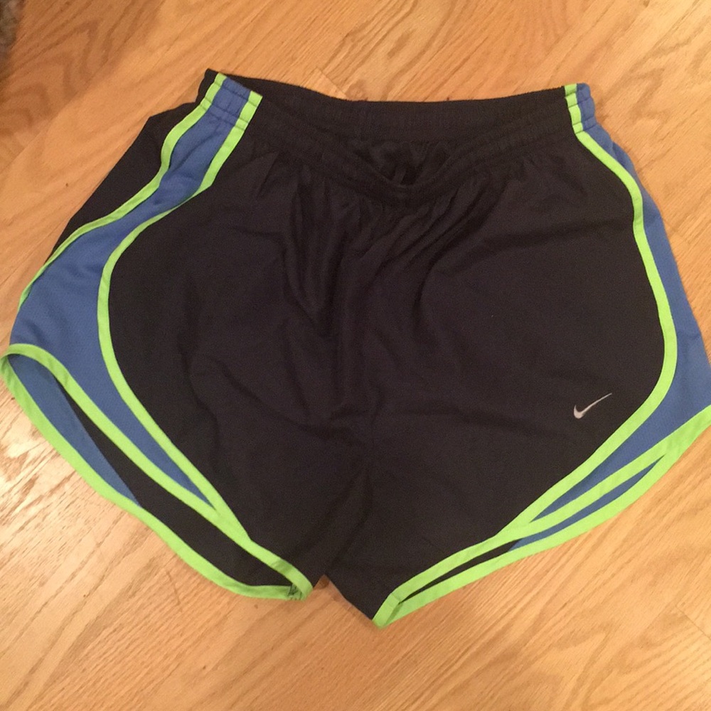 Nike dri-fit navy blue/neon green running shorts.